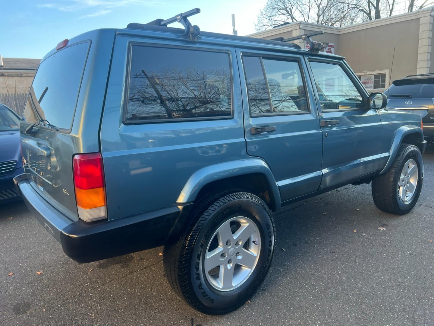 1999 Blue Jeep Cherokee (1J4FF68SXXL) with an 6 cyl. 4.0 engine, located at 1018 Brunswick Ave, Trenton, NJ, 08638, (609) 989-0900, 40.240086, -74.748085 - Photo#3